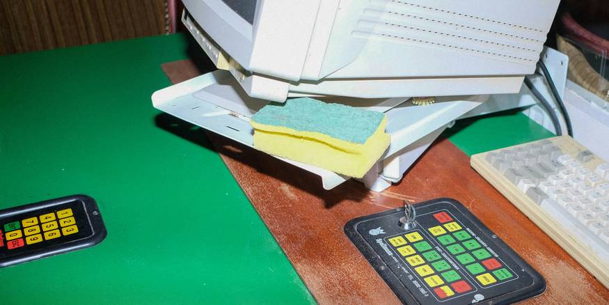 Landlord creating a security-deposit receipt on a laptop for a Michigan rental