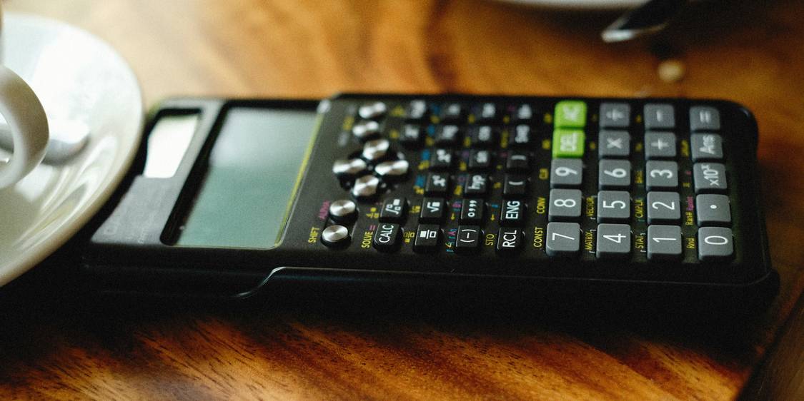 Michigan renter uses a laptop to access online calculators for budgeting