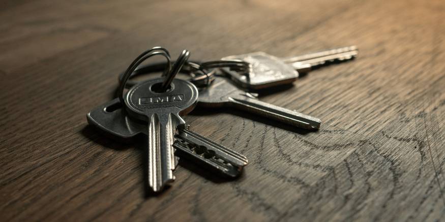 Michigan renter proudly holds apartment keys after learning their rights