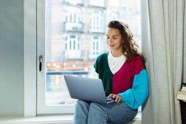Tenant sends proof of renters insurance via laptop